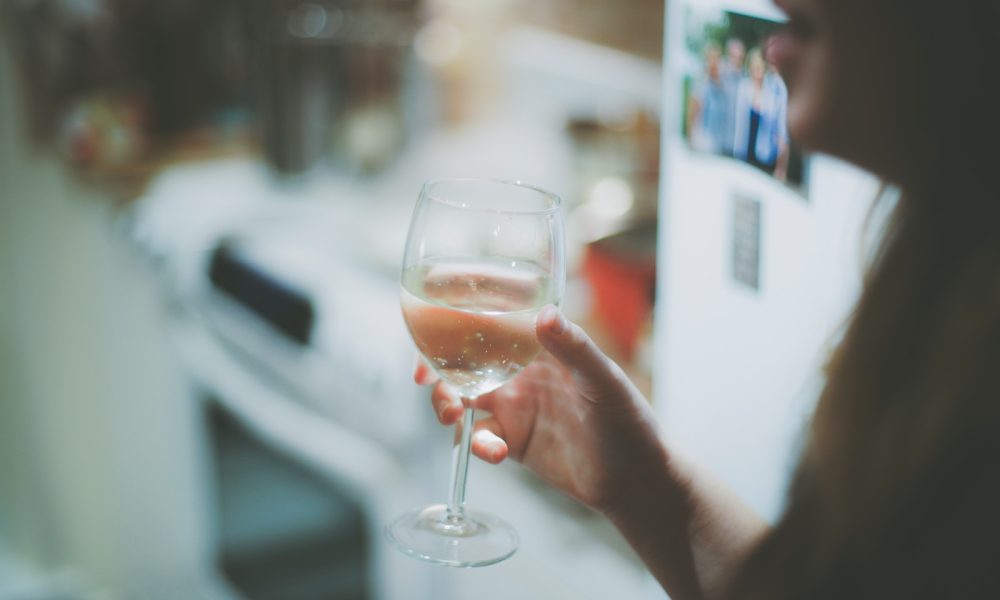 wine glass filled with water Iconic Wine Labels